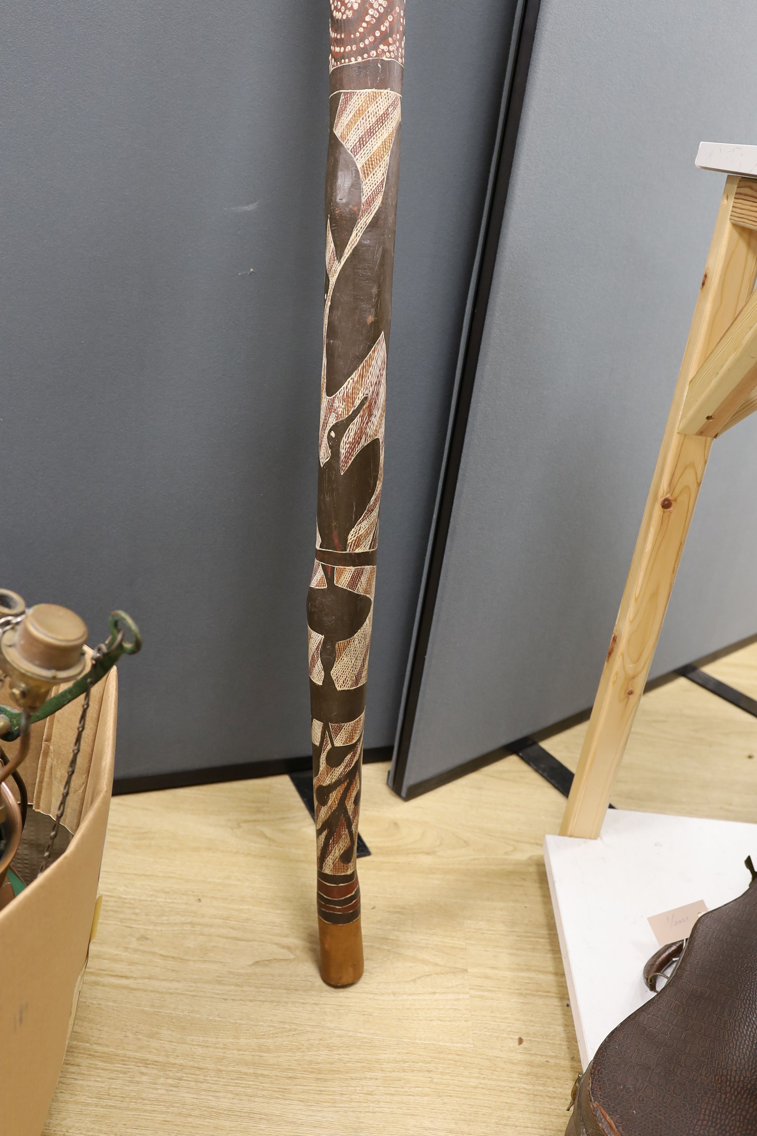 A 20th century Australian aboriginal spear and holder and 2 boomerangs., Spear 142 cms long.